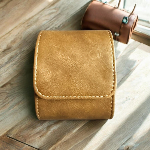 TimelessPieces by Marcel brown faux leather 1-slot watch roll with soft interior for travel and storage.