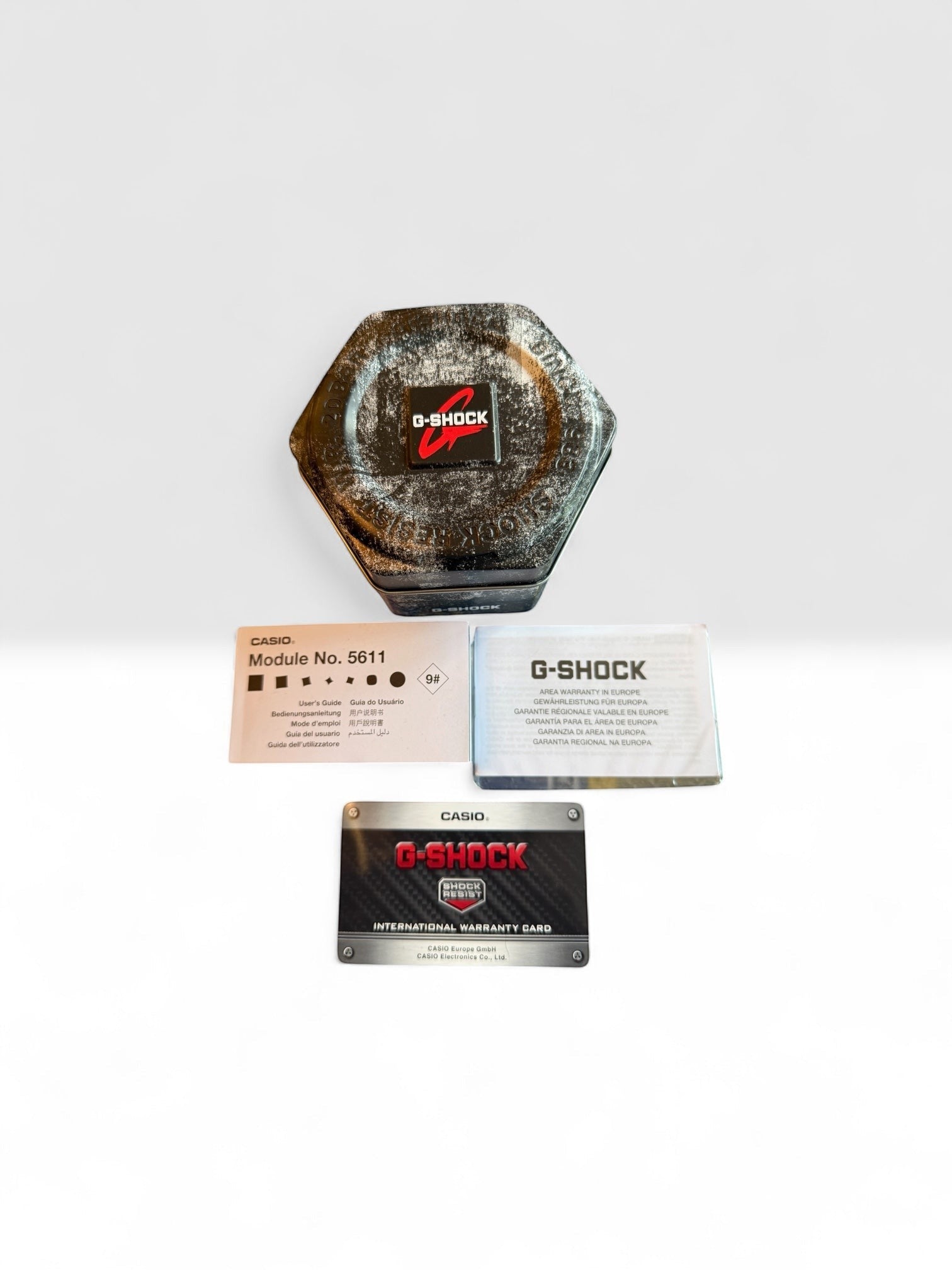 TimelessPieces by Marcel: Casio G-Shock GA-2100 Transparent watch box with user manual and warranty card.